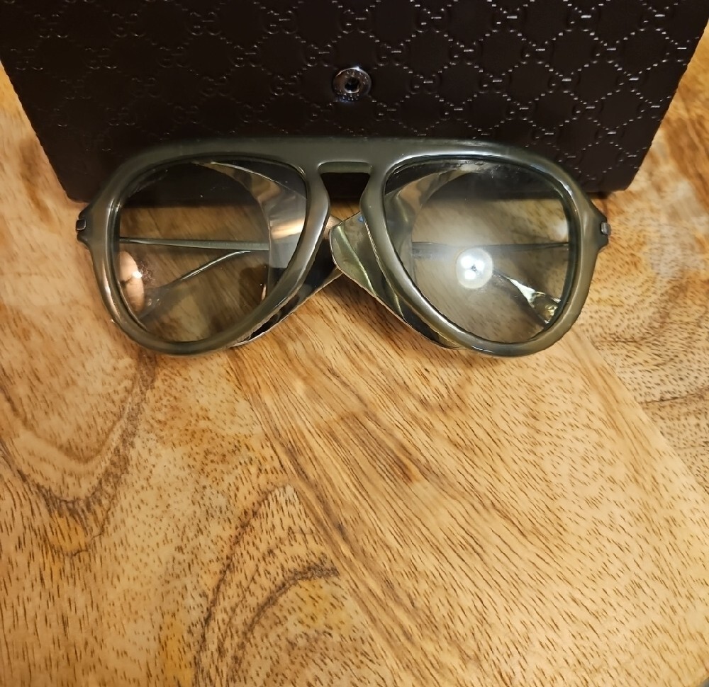 Gucci Women's Olive Green Frame Sunglasses with Silver Temples
